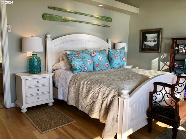 bedroom featuring light wood-type flooring