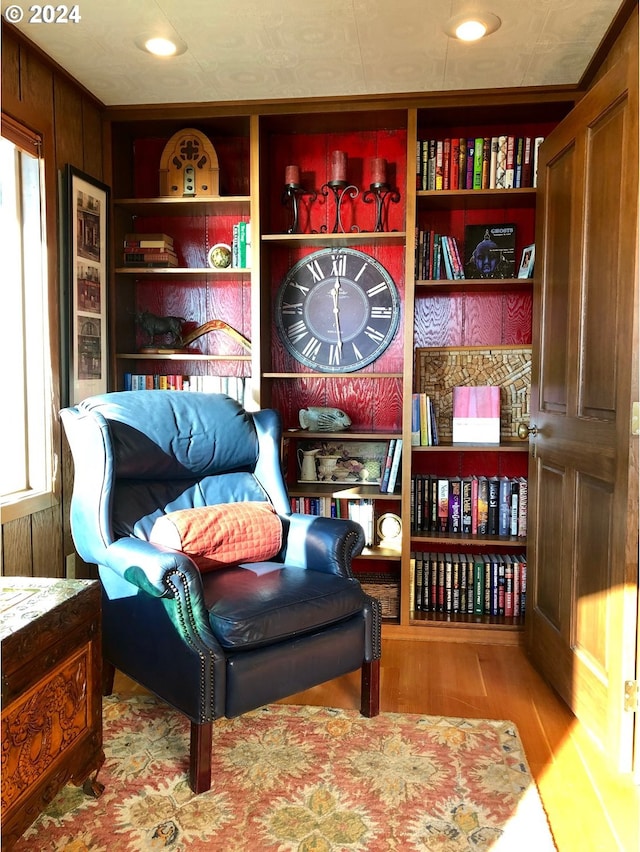 living area with light hardwood / wood-style floors