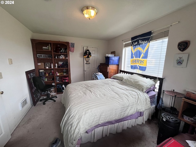 bedroom featuring carpet