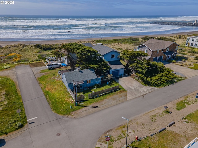 aerial view with a view of the beach and a water view