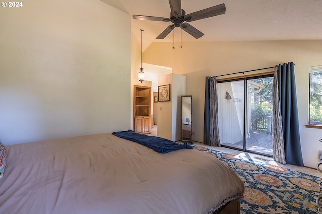 unfurnished bedroom featuring ceiling fan, high vaulted ceiling, and access to exterior