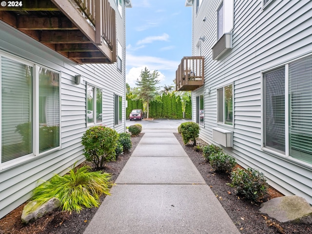 view of property exterior featuring a balcony