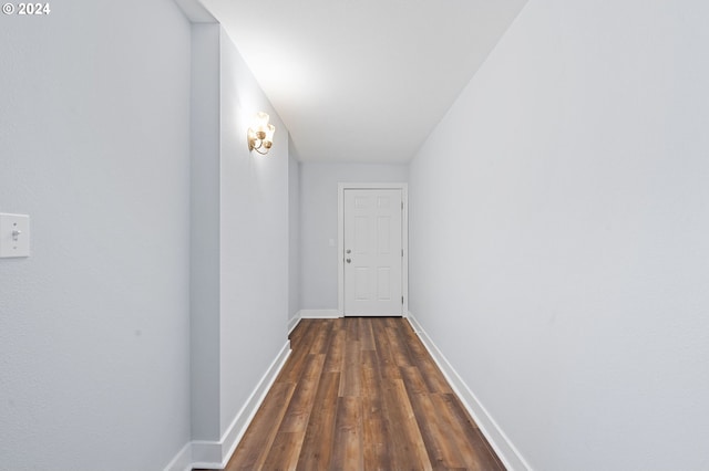 hallway featuring dark hardwood / wood-style floors