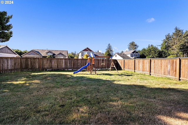 view of yard with a playground