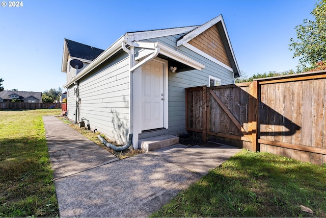 exterior space with a front lawn