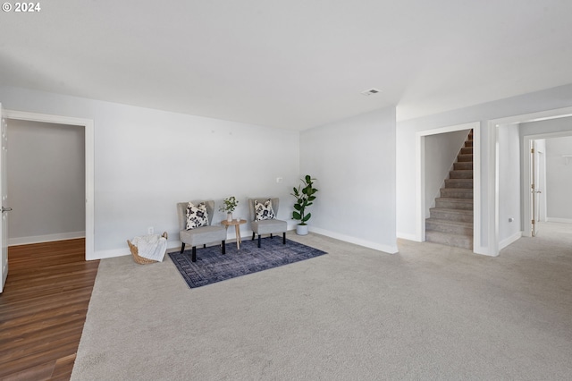 sitting room featuring hardwood / wood-style floors