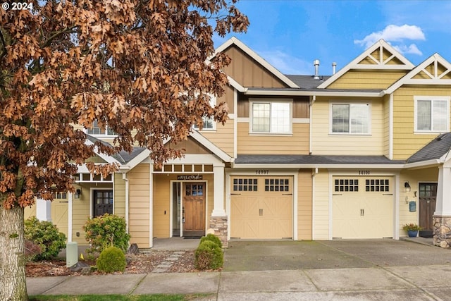 craftsman house with a garage