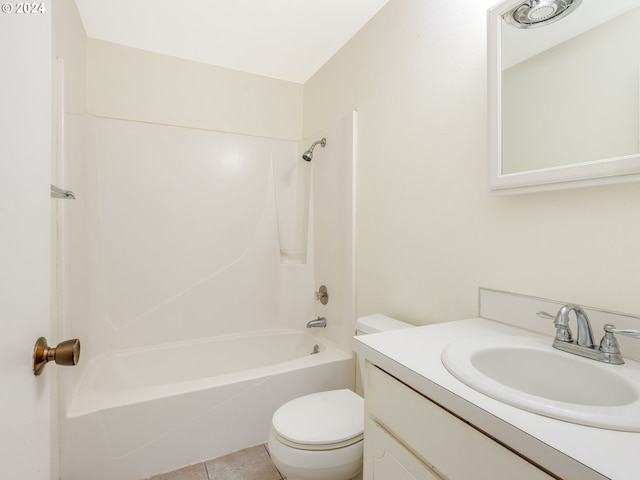 full bathroom with washtub / shower combination, vanity, toilet, and tile patterned flooring