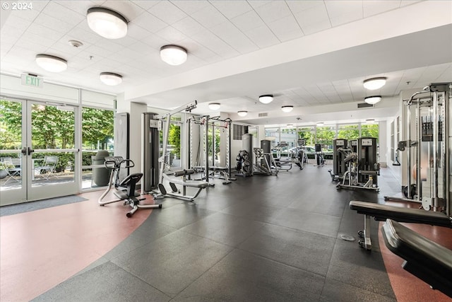 gym with floor to ceiling windows