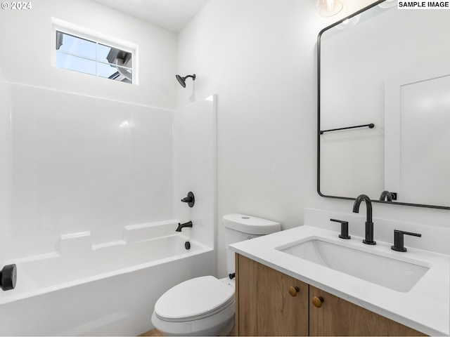 full bathroom with shower / washtub combination, vanity, and toilet