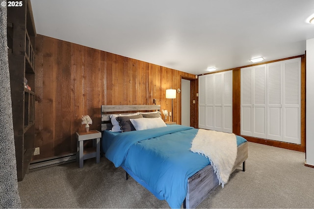 bedroom with two closets and carpet floors