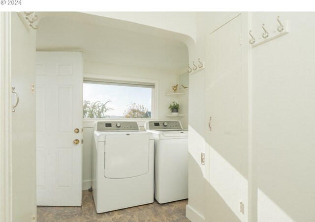 laundry room with washing machine and clothes dryer