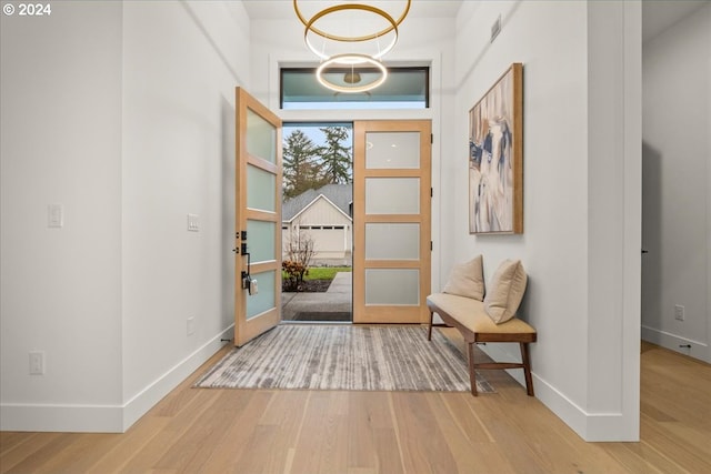 foyer entrance featuring wood-type flooring