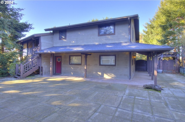 view of front of property featuring a patio