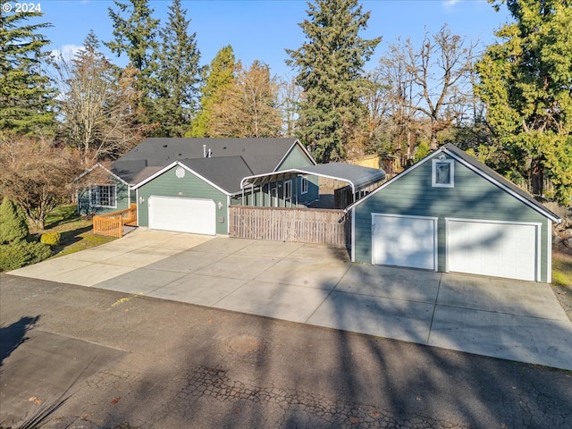 ranch-style home featuring a garage