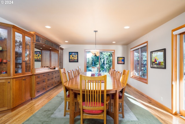 dining area with light hardwood / wood-style floors