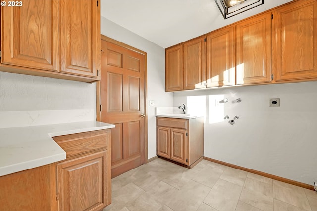 27717 Royal Ave, Eugene, OR 97402 - laundry room with electric dryer hookup, cabinet space, baseboards, and washer hookup