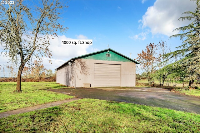 garage with a lawn