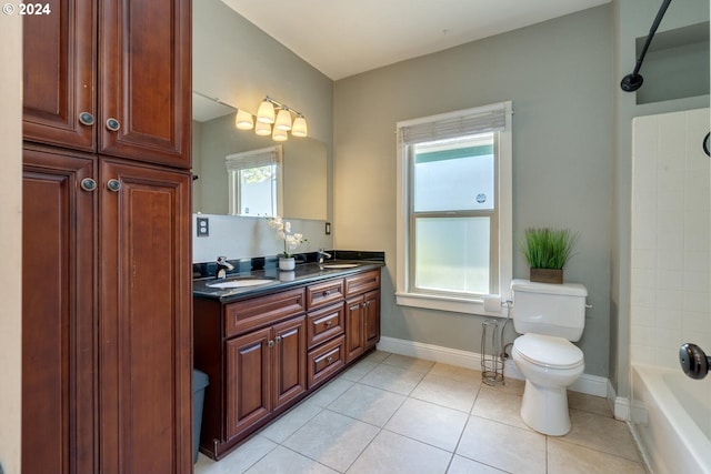 full bathroom with tile patterned floors, washtub / shower combination, vanity, and toilet