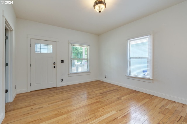 foyer with light hardwood / wood-style floors