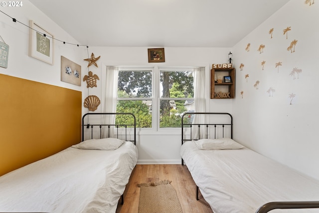 bedroom with light hardwood / wood-style flooring