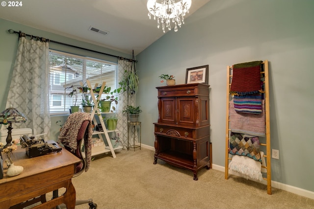 carpeted home office featuring lofted ceiling and an inviting chandelier