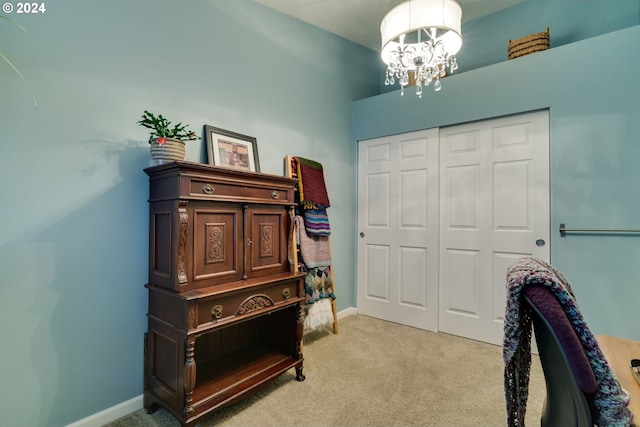 interior space with a closet and a chandelier