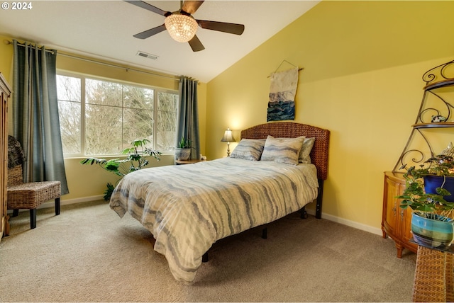 carpeted bedroom featuring ceiling fan and lofted ceiling