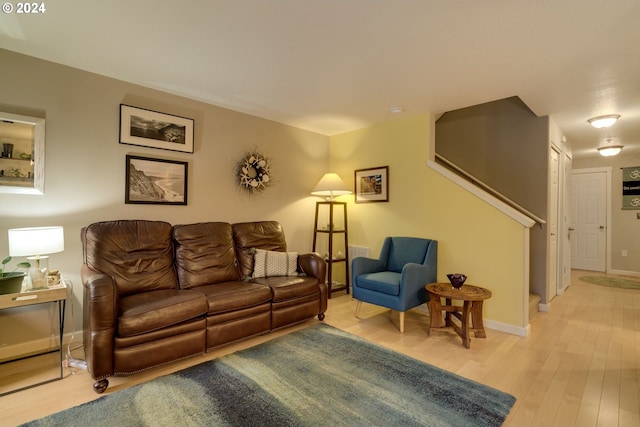 living room with light hardwood / wood-style flooring