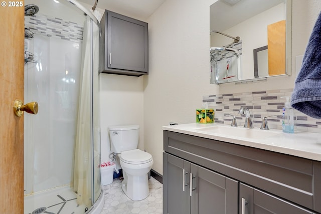 4837 Auburn Rd NE, Salem, OR 97301 - bathroom with a stall shower, tasteful backsplash, vanity, and toilet