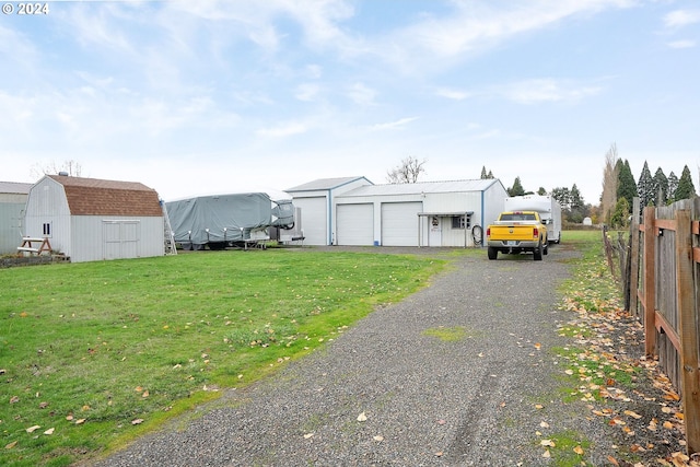 exterior space with a lawn and a garage