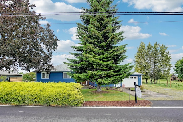 4837 Auburn Rd NE, Salem, OR 97301 - obstructed view of property featuring driveway and a garage