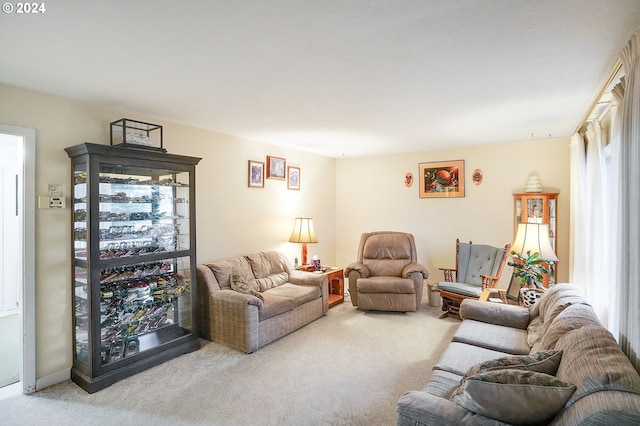 living room featuring light colored carpet