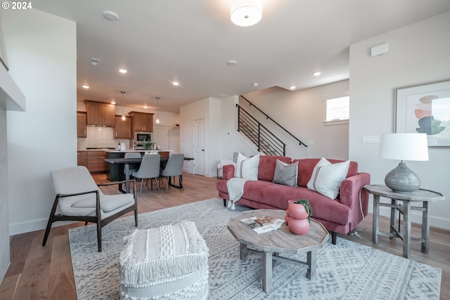 living room featuring light wood-type flooring