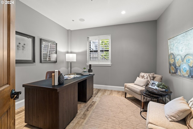 home office featuring recessed lighting, light wood-style flooring, and baseboards