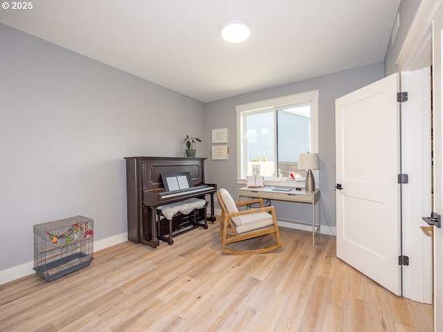 living area featuring light hardwood / wood-style floors