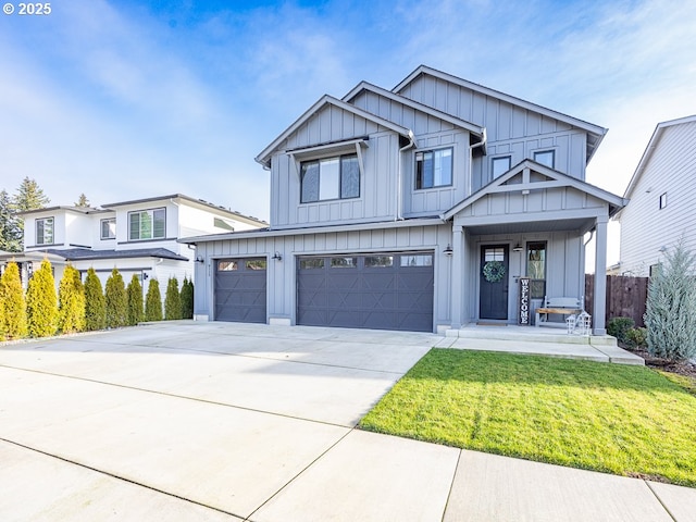 view of front facade featuring a front yard and a garage