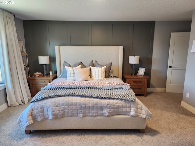 bedroom with light colored carpet