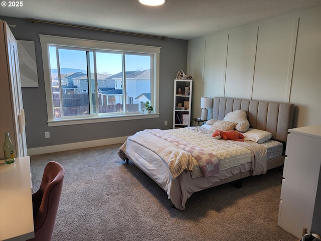 bedroom featuring carpet