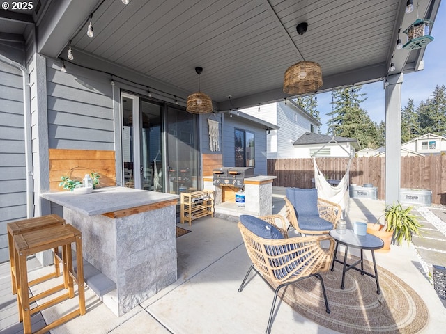 view of patio / terrace with a bar