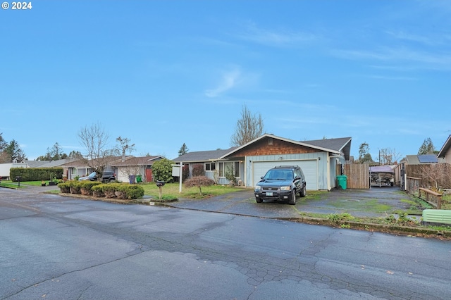 single story home with a garage