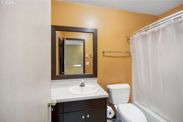 full bathroom featuring toilet, vanity, and shower / bathtub combination with curtain