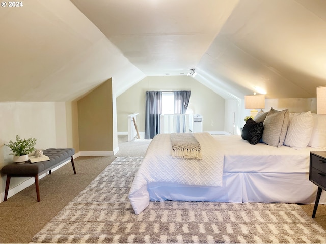 1035 NE Killingsworth St, Portland, OR 97211 - carpeted bedroom with vaulted ceiling and baseboards