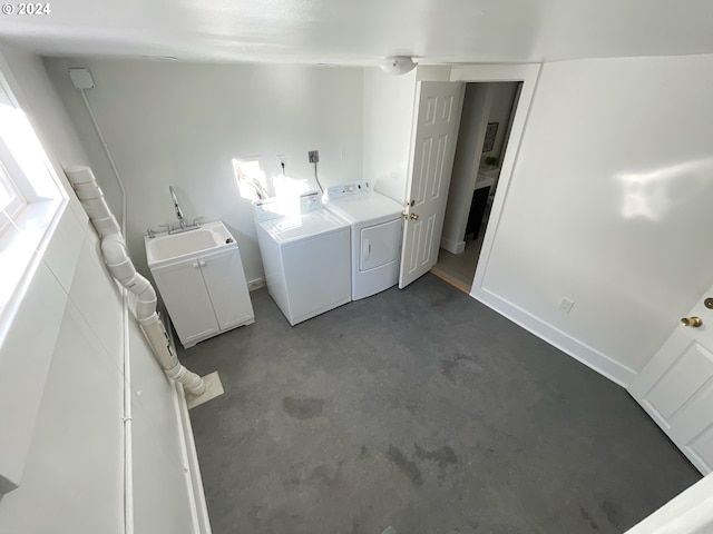 1035 NE Killingsworth St, Portland, OR 97211 - clothes washing area featuring washing machine and clothes dryer and cabinet space