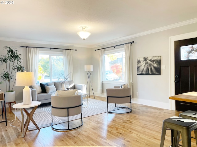 1035 NE Killingsworth St, Portland, OR 97211 - living room with light wood-type flooring, crown molding, and plenty of natural light