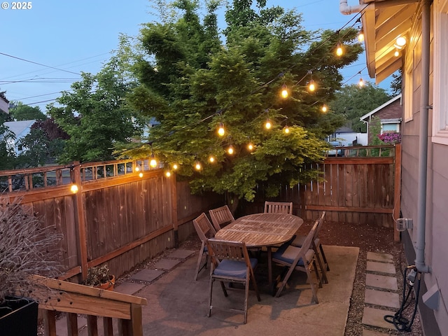 1035 NE Killingsworth St, Portland, OR 97211 - view of patio / terrace featuring a fenced backyard and outdoor dining area