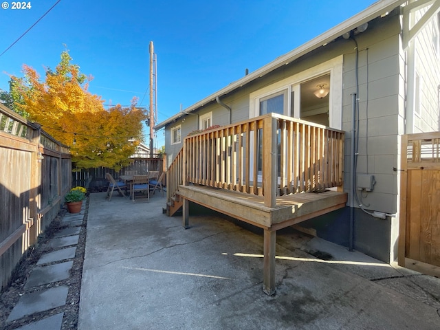 1035 NE Killingsworth St, Portland, OR 97211 - view of patio / terrace with a fenced backyard and a deck