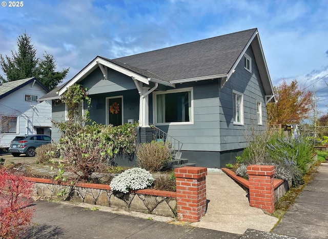 1035 NE Killingsworth St, Portland, OR 97211 - view of front of property featuring a shingled roof