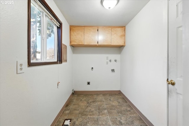 18495 SW Springfield St, Beaverton, OR 97078 - laundry room featuring cabinet space, electric dryer hookup, baseboards, stone finish floors, and hookup for a washing machine