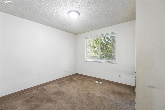 18495 SW Springfield St, Beaverton, OR 97078 - carpeted spare room with a textured ceiling and baseboards